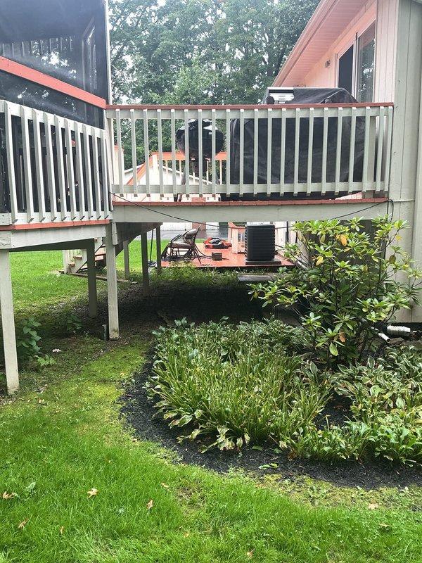 Conducted comprehensive electrical estimate for backup generator installation at residential property. Assessed existing electrical panel configuration, circuit capacity, and required modifications for generator integration, including evaluation of transfer switch placement and necessary wiring routes through unfinished interior spaces. Documented current electrical infrastructure, outdoor installation area near elevated deck structure, and optimal generator positioning to ensure proper clearances from building structures and landscaping features while maintaining code compliance and accessibility for future maintenance.