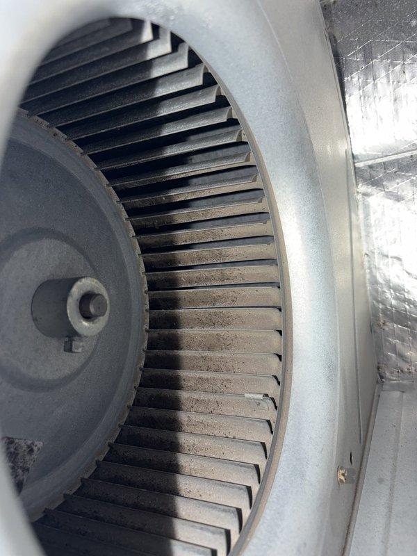 Completed scheduled preventive maintenance on residential cooling system as part of ongoing service agreement. Performed comprehensive inspection of air handler unit, including blower assembly and internal components. Blower wheel showed moderate dust accumulation on blades, which is typical for operational equipment. Verified blower motor operation and inspected electrical connections. All components found functioning within normal parameters. System operational upon completion of maintenance visit.