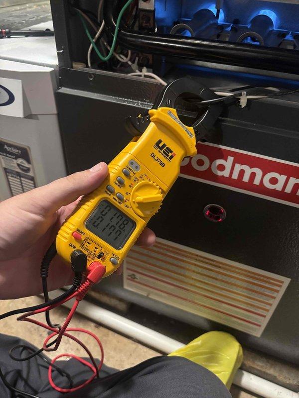 Completed comprehensive tune-up and inspection on two Goodman furnaces (models GM9S800804BN and GM9S800804CN), both approximately 3 years old. Performed electrical diagnostics using digital multimeter to verify proper voltage and amperage readings across system components, inspected blower assembly and internal wiring connections, and replaced air filters as requested. All systems tested and operating within manufacturer specifications.