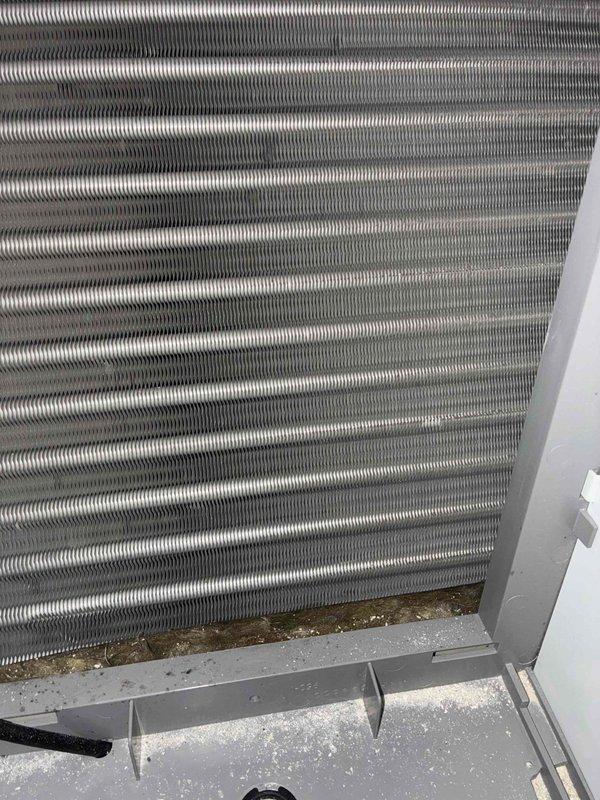 Completed routine heating system maintenance inspection. Examined heat exchanger coil assembly, noting minor dirt and debris accumulation at the base of the fins but overall intact condition. Recorded temperature readings at ductwork location measuring 18.0 degrees, verifying proper system operation and airflow parameters. Completed routine heating system maintenance inspection. Examined heat exchanger coil assembly, noting minor dirt and debris accumulation at the base of the fins but overall intact condition. Recorded temperature readings at ductwork location measuring 18.0 degrees, verifying proper system operation and airflow parameters.