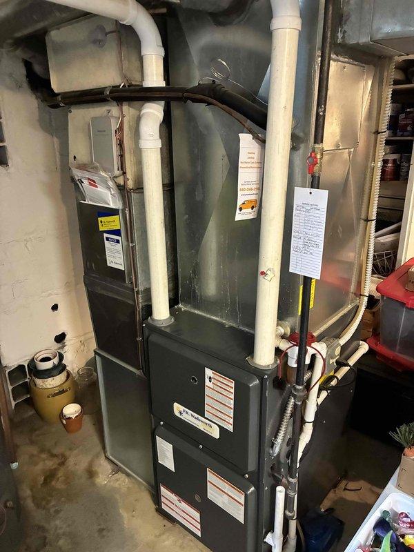 Completed scheduled heating maintenance on residential gas furnace system as part of ongoing preventative maintenance program. Performed comprehensive inspection of furnace cabinet, gas valve assembly, heat exchanger, and all associated mechanical components. Verified proper operation of gas valve connections, control wiring, and safety mechanisms. Inspected burner assembly, flame sensor, and ignition system for proper function. Checked all electrical connections including ground wires and control board wiring harness. Examined PVC venting system and condensate drainage lines for proper installation and flow. Verified evaporator coil condition and refrigerant line connections. System tested and operating within manufacturer specifications with all safety controls functioning properly.