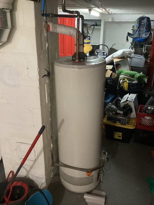 Responded to service call for tanked water heater with pilot light that would not remain lit. Upon inspection of the residential gas water heater unit, diagnosed thermocouple failure preventing proper flame detection and causing pilot light to extinguish. Collected standard service call fee for diagnostic visit and provided customer with repair options to restore hot water functionality.