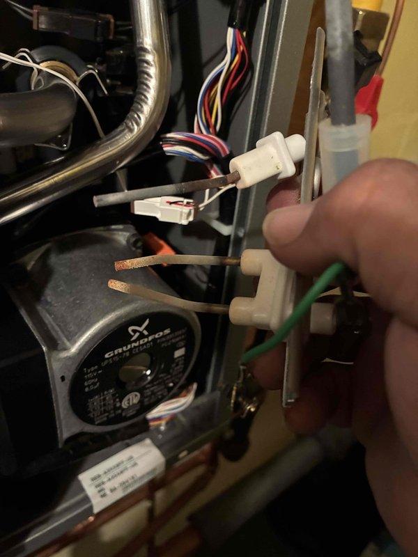 Responded to no-heat call on residential boiler system. Upon arrival, diagnosed electrical connection failure affecting boiler operation. Disconnected and inspected wiring harnesses and spade connectors at control board and Grundfos circulation pump. Reconnected all electrical connections, verified proper wire routing, and tested system functionality. Boiler restored to normal operation with heat confirmed working.