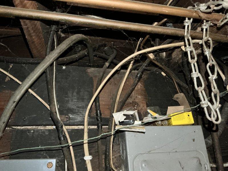 Performed on-site evaluation of 20-year-old steam boiler system located in basement mechanical room for replacement estimate. Assessed existing boiler unit, associated steam piping, insulation condition, and connected water heater to determine scope of replacement work. Documented current system configuration including deteriorated pipe insulation, copper supply lines, electrical connections, and existing mechanical infrastructure to provide comprehensive replacement recommendations.