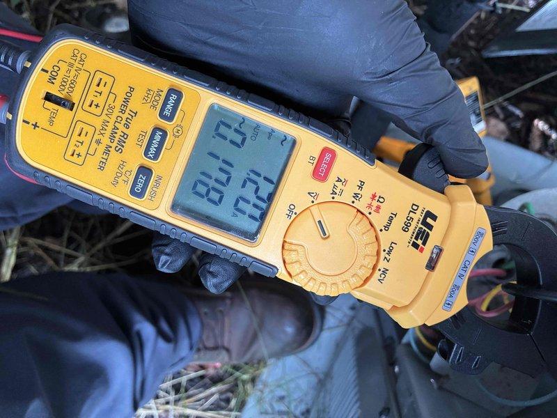 Responded to service call regarding high electric bills and potential AC system issues. Performed diagnostic inspection on both air conditioning units. Discovered failed capacitor on one unit exhibiting severe corrosion, burnt terminal connections, and electrical degradation from weather exposure. Tested electrical components with multimeter to verify capacitor failure and confirm system voltages. Identified the deteriorated capacitor as primary cause of system inefficiency, which would result in increased electrical consumption and reduced cooling performance. Recommended immediate capacitor replacement to restore proper system operation and reduce energy costs.