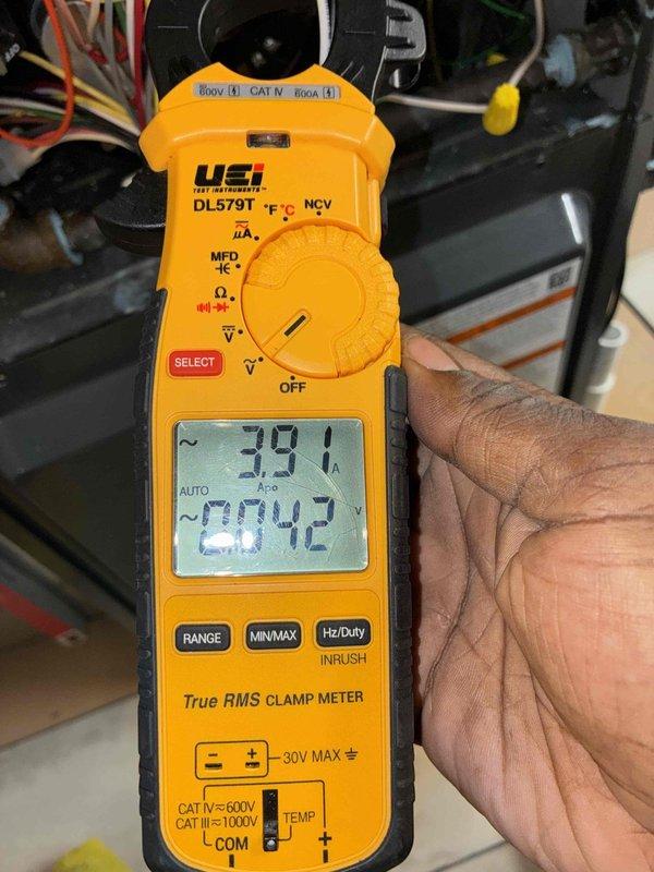 Completed scheduled heating maintenance visit on residential furnace system. Performed comprehensive system inspection including electrical measurements using digital clamp meter, recording operating amperage of 39.1A and verifying proper voltage readings to confirm system performance within manufacturer specifications. Replaced HVAC air filters with new pleated media filters to maintain optimal airflow and indoor air quality for the heating season.