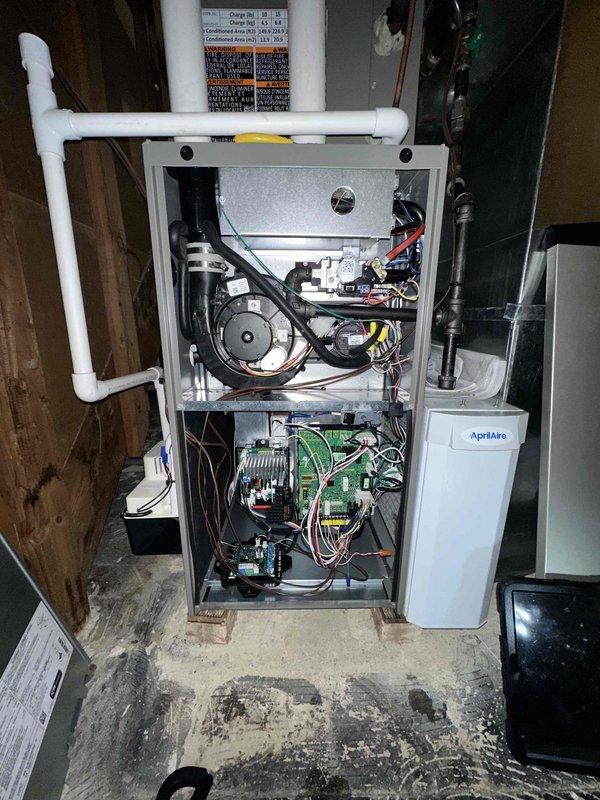# HVAC Heating Maintenance Completed

Performed comprehensive preventive maintenance on residential Lennox furnace system as part of scheduled heating season service visit. Conducted thorough inspection of all internal components including blower motor assembly, heat exchanger, control board, and electrical connections. Verified proper operation of all safety controls, tested system cycling, and confirmed adequate airflow through ductwork. Inspected AprilAire humidifier for proper function and integration with heating system. All components found operating within manufacturer specifications with no deficiencies noted requiring immediate attention.
