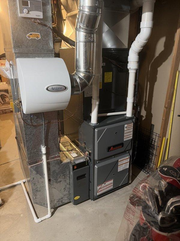 Completed scheduled furnace maintenance on Amana heating system. Replaced dirty air filter and inspected all system components including Aprilaire humidifier integration and condensate drainage. Noted significant frost buildup on evaporator coil surface with temperature reading of 81.3°F, indicating potential airflow restriction or refrigerant issue that will require further evaluation. All accessible ductwork, electrical connections, and safety controls verified operational at time of service.