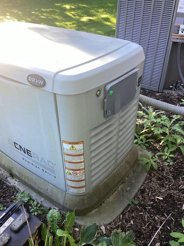 Performed scheduled maintenance on a Generac Guardian Series 22kW residential backup generator. Completed maintenance reset procedure through the Evolution controller interface, verified all system indicators functioning properly with AUTO/MANUAL/OFF controls operational and display responding correctly. Unit confirmed in good working condition with all safety systems tested and operational.