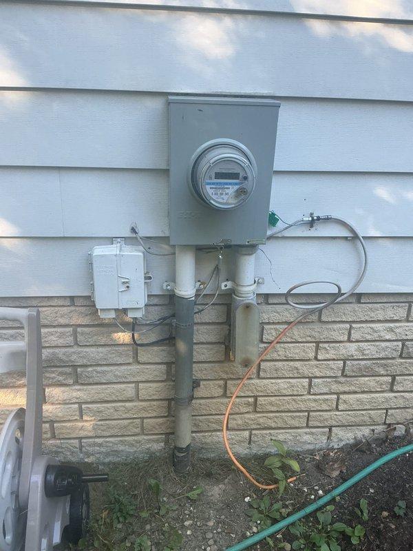 Conducted electrical estimate for residential circuit breaker panel replacement. Inspected exterior electrical service entrance including meter enclosure, conduit routing, and service connections on home exterior with vinyl siding and brick veneer. Evaluated interior main electrical panel mounted in basement utility area, assessed existing circuit breaker configuration, wire routing from panel to ceiling joists, and overall panel condition to provide accurate replacement pricing. Conducted electrical estimate for residential circuit breaker panel replacement. Inspected exterior electrical service entrance including meter enclosure, conduit routing, and service connections on home exterior with vinyl siding and brick veneer. Evaluated interior main electrical panel mounted in basement utility area, assessed existing circuit breaker configuration, wire routing from panel to ceiling joists, and overall panel condition to provide accurate replacement pricing.