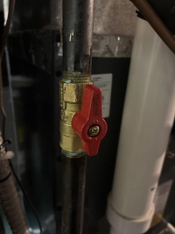 Completed installation of a 96% AFUE high-efficiency furnace system. Verified proper gas pressure at 3.509 inches of water column using calibrated digital manometer, confirming optimal combustion parameters. Installed new gas shut-off valve with quarter-turn ball valve for safety and code compliance, integrated into existing gas line infrastructure with proper brass fittings and black iron pipe connections.