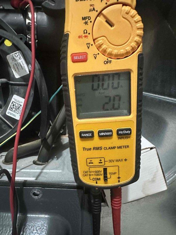 Completed comprehensive heating maintenance on furnace system as part of ongoing preventive maintenance program. Performed thorough inspection of furnace interior compartment, examining all electrical connections, wiring harnesses, and control components for proper operation and safety compliance. Verified electrical amperage draws using clamp meter to ensure system is operating within manufacturer specifications. Inspected all wire terminations including brown, red, blue, purple, white, and yellow control wiring for secure connections and proper routing. Checked condition of insulated refrigerant lines and verified all safety warning labels remain legible and intact. All components found operating normally with no deficiencies noted. System ready for heating season operation.
