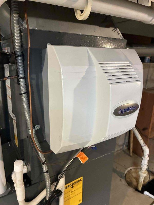 Completed installation of a high-efficiency 96% AFUE furnace with matching air conditioning system and Aprilaire whole-home humidifier. The new HVAC equipment was installed with proper electrical disconnect, condensate drainage via PVC piping, and all necessary safety controls and wiring connections. All components were tested and commissioned to ensure optimal system performance and integration.