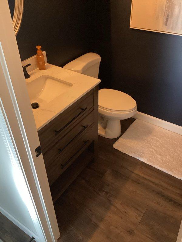 Responded to complaint of sewer odor in first-floor half bathroom following recent renovation. Inspected toilet installation and confirmed improper wax ring seal was causing odor infiltration. Removed toilet, replaced faulty wax ring with proper-sized wax seal, reset toilet to flange, and verified proper seal with leak test. Sewer odor issue resolved.