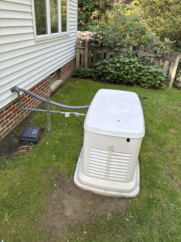 Conducted on-site evaluation of 15-year-old Comfort Maker furnace system and provided replacement options to homeowner. Documented existing electrical panel configuration and outdoor equipment setup, including standby generator installation, to assess compatibility requirements for new furnace installation.