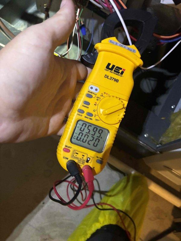 Completed routine heating maintenance on an 8-year-old AMANA furnace with no reported issues. Performed comprehensive tune-up including electrical testing with multimeter to verify proper voltage and system performance, inspected ductwork for debris accumulation and structural integrity, and confirmed all components operating within normal parameters.