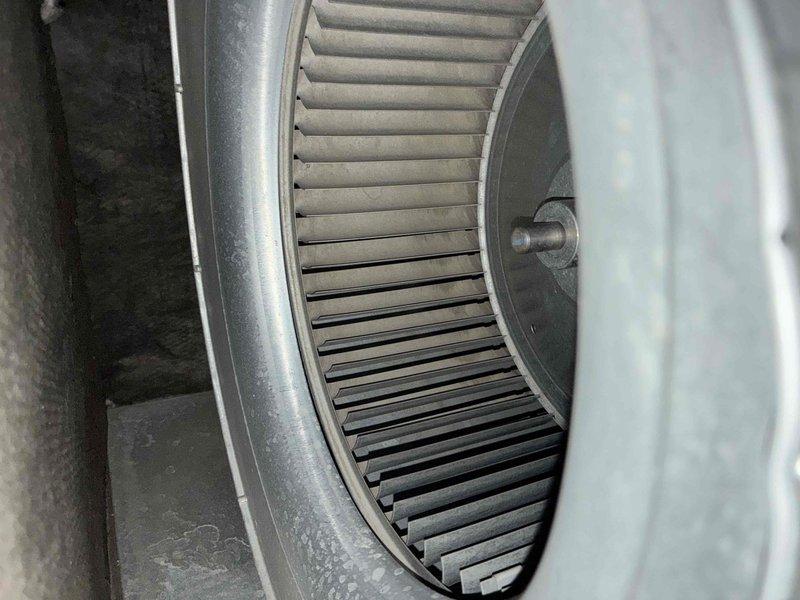 Completed heating maintenance tune-up on residential HVAC system. Performed combustion analysis using digital flue gas analyzer, confirming efficient operation with readings of 95.9% efficiency, 154.4°F exhaust temperature, and safe 14 PPM carbon monoxide levels. Inspected blower assembly and documented moderate dust accumulation on squirrel-cage fan wheel; system operating within normal parameters.