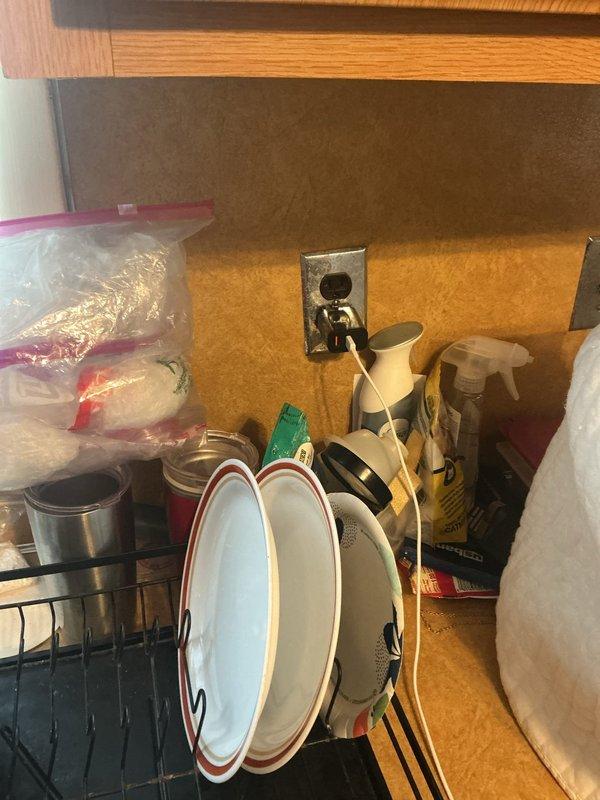 Responded to service call for breaker tripping when operating air fryer. Performed comprehensive electrical estimate for panel replacement and conducted safety inspection of outlets, with particular attention to receptacles in proximity to water sources including kitchen counter outlets near sink area and basement utility room near water heater. Assessed existing electrical panel capacity and condition to determine upgrade requirements for handling increased appliance loads and ensuring code-compliant circuit protection throughout the residence.