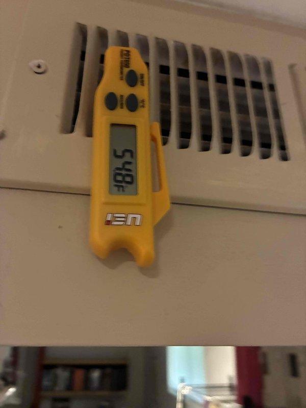 Completed routine HVAC cooling system maintenance inspection. Verified proper system operation with supply air temperature measuring 57.8°F at register, confirming adequate cooling performance. Inspected electrical connections, wiring, and control components for proper installation and secure mounting.
