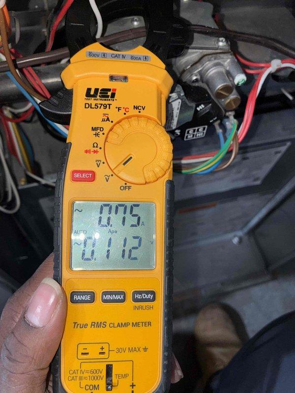 Completed seasonal heating maintenance on 11-year-old Comfortmaker system. Performed comprehensive system diagnostics including electrical measurements with clamp meter showing 0.75 amp draw and 411V reading, along with temperature differential testing measuring 18.25 degrees across the heat exchanger. Inspected all electrical connections, tested capacitor functionality, verified proper amperage on blower motor, and confirmed system operation within manufacturer specifications for upcoming heating season.