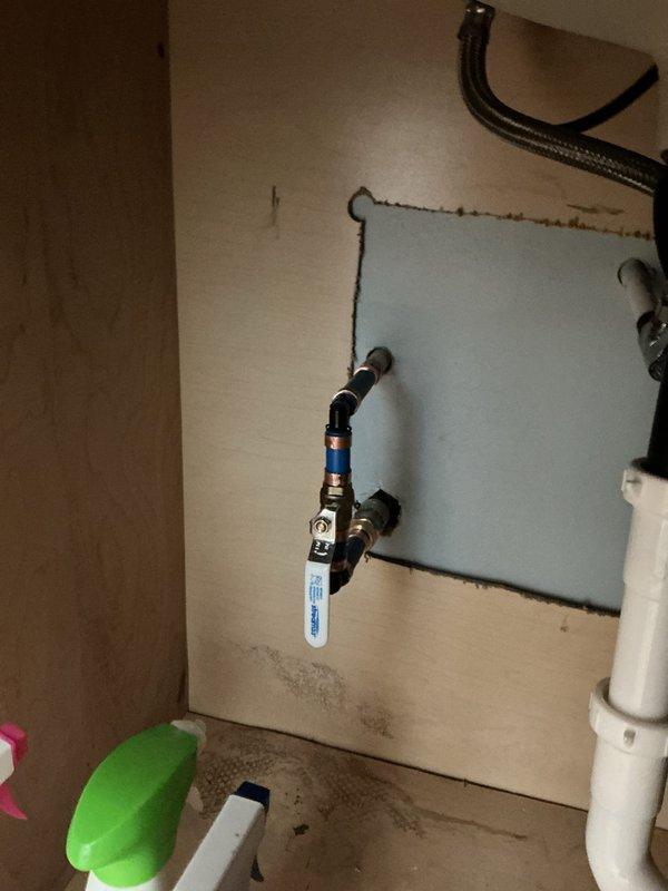 Opened wall in adjacent bathroom and installed access panel to facilitate replacement of tub and shower valve assembly with new trim kit. Removed existing exterior frost-free hose bib and installed new frost-free hose bib to restore proper outdoor water access and prevent freeze damage.