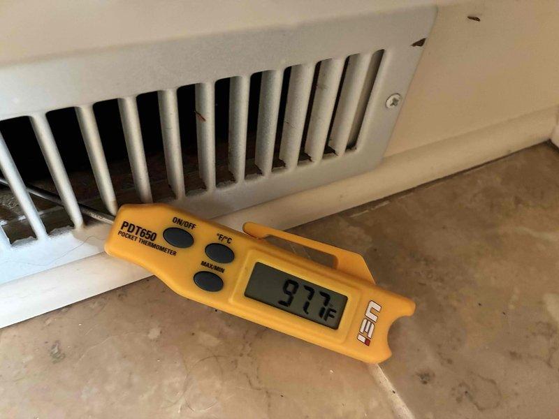 Completed scheduled preventive maintenance on residential heating system. Performed temperature diagnostics at supply register measuring 97.1°F and at furnace test port measuring 73°F, confirming proper heat rise and system operation within manufacturer specifications.