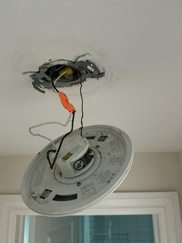 Responded to electrical emergency in bedroom where ceiling light fixture caused sparking after improper reinstallation following painter's work. Upon arrival, found fixture disconnected with exposed wiring and multiple circuits affected. Safely de-energized circuit, inspected wiring connections at junction box, identified crossed or damaged conductors that caused the arcing event. Properly terminated all wire connections using appropriate wire nuts, verified conductor integrity, securely remounted Eaton fixture to ceiling junction box, restored power and confirmed proper operation of affected lighting circuits throughout the area. Responded to electrical emergency in bedroom where ceiling light fixture caused sparking after improper reinstallation following painter's work. Upon arrival, found fixture disconnected with exposed wiring and multiple circuits affected. Safely de-energized circuit, inspected wiring connections at junction box, identified crossed or damaged conductors that caused the arcing event. Properly terminated all wire connections using appropriate wire nuts, verified conductor integrity, securely remounted Eaton fixture to ceiling junction box, restored power and confirmed proper operation of affected lighting circuits throughout the area.