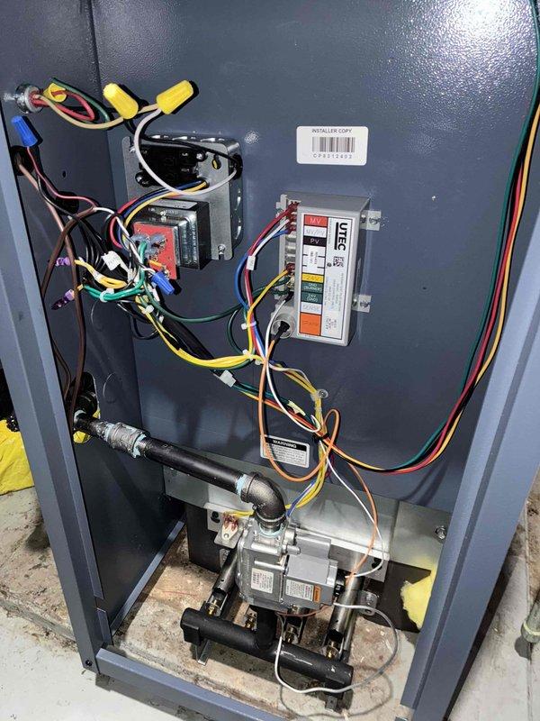 Completed boiler system installation at residential property. New boiler unit was successfully installed with all electrical components, control boards, and wiring properly connected and secured within the equipment cabinet. Circulator pump assembly was mounted and connected with appropriate piping, and all safety controls and diagnostic systems were verified operational upon startup. Completed boiler system installation at residential property. New boiler unit was successfully installed with all electrical components, control boards, and wiring properly connected and secured within the equipment cabinet. Circulator pump assembly was mounted and connected with appropriate piping, and all safety controls and diagnostic systems were verified operational upon startup.