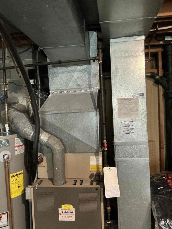 Completed comprehensive HVAC system replacement estimate for residential property, evaluating existing furnace and air conditioning equipment located in basement utility area and exterior condenser unit. Documented current system configuration including ductwork, air handler components, and outdoor condensing unit, photographing all major components to provide homeowner with full system replacement options and equipment recommendations. Completed comprehensive HVAC system replacement estimate for residential property, evaluating existing furnace and air conditioning equipment located in basement utility area and exterior condenser unit. Documented current system configuration including ductwork, air handler components, and outdoor condensing unit, photographing all major components to provide homeowner with full system replacement options and equipment recommendations.