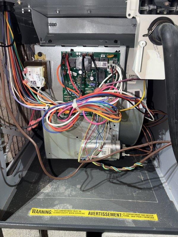 Performed comprehensive heating system maintenance on HVAC unit. Conducted thorough inspection of internal components including circuit board, electrical connections, wire harnesses, and blower assembly with access panel removed. Performed combustion analysis testing using calibrated analyzer, recording readings of 61°F and 28 ppm to verify proper system operation and combustion efficiency. All components found operating within normal parameters and unit returned to service.