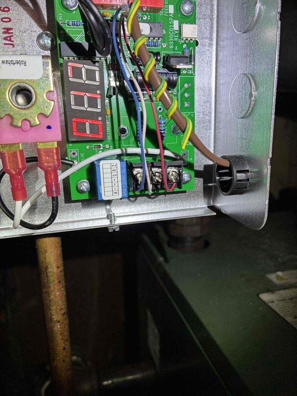 Completed scheduled preventive maintenance on commercial boiler system. Performed comprehensive inspection of mechanical room equipment, including all piping systems, valves, and connections. Examined and tested boiler control board with digital display panel showing proper operational readings at 0.0 setpoint. Verified all electrical connections, terminal blocks, and wiring harnesses were secure with no signs of overheating or corrosion. Inspected colored piping system including supply and return lines, flexible hoses, and brass fittings for leaks or deterioration. Confirmed proper operation of control relays, LED indicators, and safety circuits on main PCB. All system components found to be functioning within normal parameters with no immediate repairs required. Completed scheduled preventive maintenance on commercial boiler system. Performed comprehensive inspection of mechanical room equipment, including all piping systems, valves, and connections. Examined and tested boiler control board with digital display panel showing proper operational readings at 0.0 setpoint. Verified all electrical connections, terminal blocks, and wiring harnesses were secure with no signs of overheating or corrosion. Inspected colored piping system including supply and return lines, flexible hoses, and brass fittings for leaks or deterioration. Confirmed proper operation of control relays, LED indicators, and safety circuits on main PCB. All system components found to be functioning within normal parameters with no immediate repairs required.