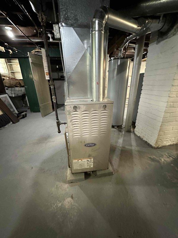 Completed comprehensive heating system maintenance on a Carrier residential furnace located in basement installation. Performed standard preventative maintenance procedures including inspection of blower motor assembly with Copeland components, verification of gas piping connections, examination of ductwork connections and seals, and assessment of electrical wiring integrity. All equipment found operating within normal parameters with no deficiencies noted. Completed comprehensive heating system maintenance on a Carrier residential furnace located in basement installation. Performed standard preventative maintenance procedures including inspection of blower motor assembly with Copeland components, verification of gas piping connections, examination of ductwork connections and seals, and assessment of electrical wiring integrity. All equipment found operating within normal parameters with no deficiencies noted.