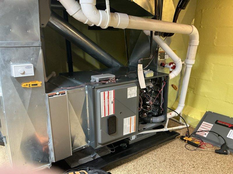 Completed comprehensive HVAC system tune-up on heating and cooling unit located in utility room. Performed standard maintenance procedures including system diagnostics with digital multimeter, electrical component testing, and operational verification of both HVAC unit and water heater system. All equipment inspected, tested, and confirmed to be functioning within normal operating parameters.