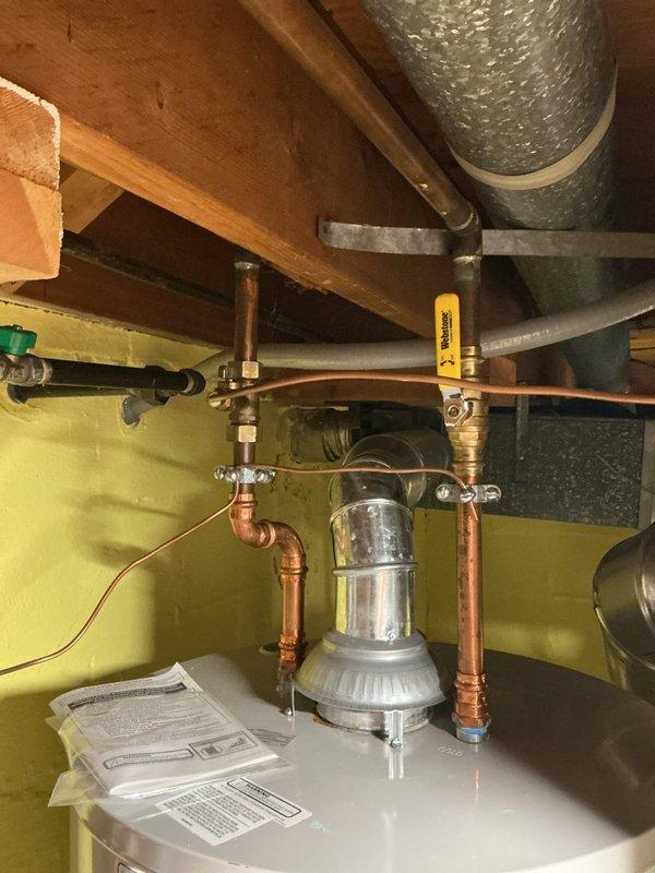 Completed comprehensive HVAC system tune-up on heating and cooling unit located in utility room. Performed standard maintenance procedures including system diagnostics with digital multimeter, electrical component testing, and operational verification of both HVAC unit and water heater system. All equipment inspected, tested, and confirmed to be functioning within normal operating parameters.