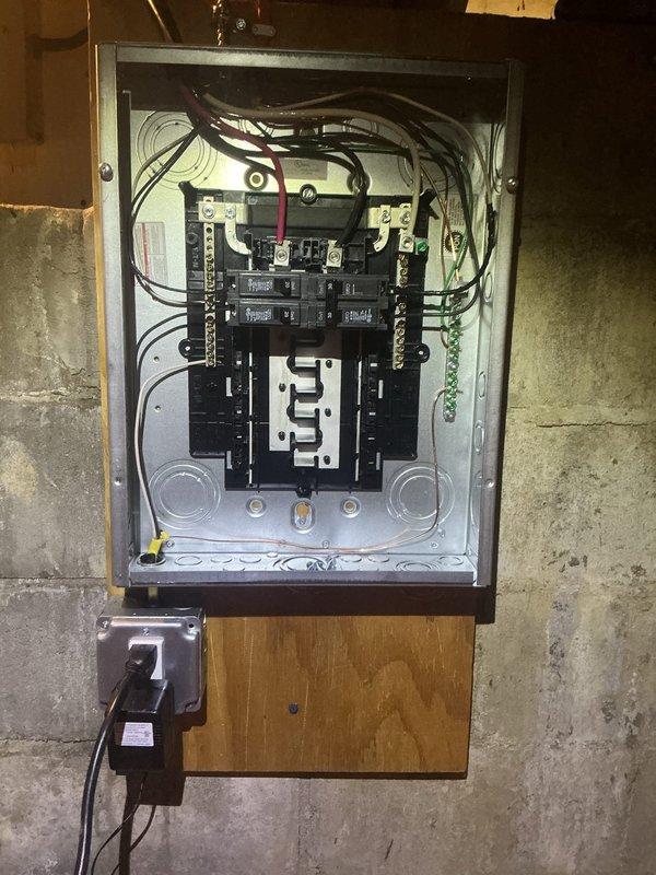 Installed sub-panel in basement utility area with dedicated circuit for plumbing equipment. Panel was mounted on concrete block wall with proper backing, wiring was routed and terminated to code specifications, and all circuit breakers were installed and tested for proper operation.