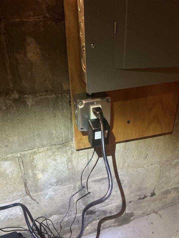 Installed sub-panel in basement utility area with dedicated circuit for plumbing equipment. Panel was mounted on concrete block wall with proper backing, wiring was routed and terminated to code specifications, and all circuit breakers were installed and tested for proper operation.
