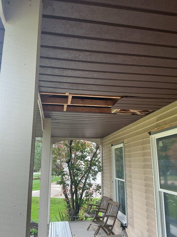 Completed electrical inspection of residential property to assess requirements for ceiling fan installations and additional electrical work. Documented existing conditions including porch ceiling damage exposing structural framing and interior switch locations for preparation of detailed scope and quotation.