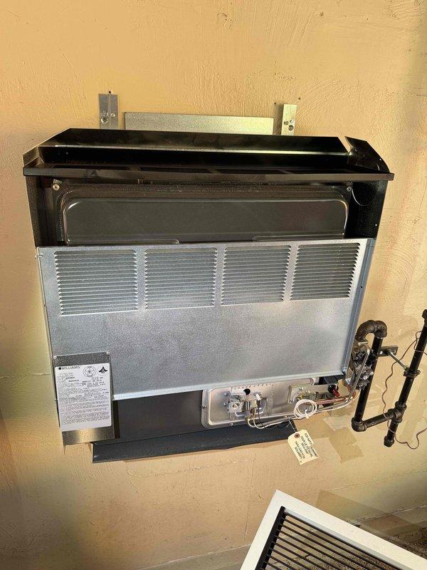 Performed routine heating maintenance on a wall-mounted garage heating unit over 10 years old. Conducted combustion analysis testing using a Testo 310 analyzer, recording oxygen levels at 18% and carbon monoxide at 36 ppm, inspected all accessible components including the heat exchanger, burner assembly, and gas valve connections, and verified proper operation of the system. Performed routine heating maintenance on a wall-mounted garage heating unit over 10 years old. Conducted combustion analysis testing using a Testo 310 analyzer, recording oxygen levels at 18% and carbon monoxide at 36 ppm, inspected all accessible components including the heat exchanger, burner assembly, and gas valve connections, and verified proper operation of the system.