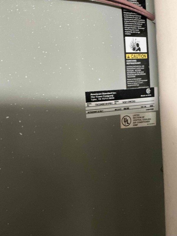 Conducted on-site evaluation of existing HVAC system and documented current equipment configuration including air handler unit, ductwork, and associated refrigerant and condensate lines. Photographed equipment specifications, manufacturer labels, and installation layout to provide comprehensive replacement options for the aging system.