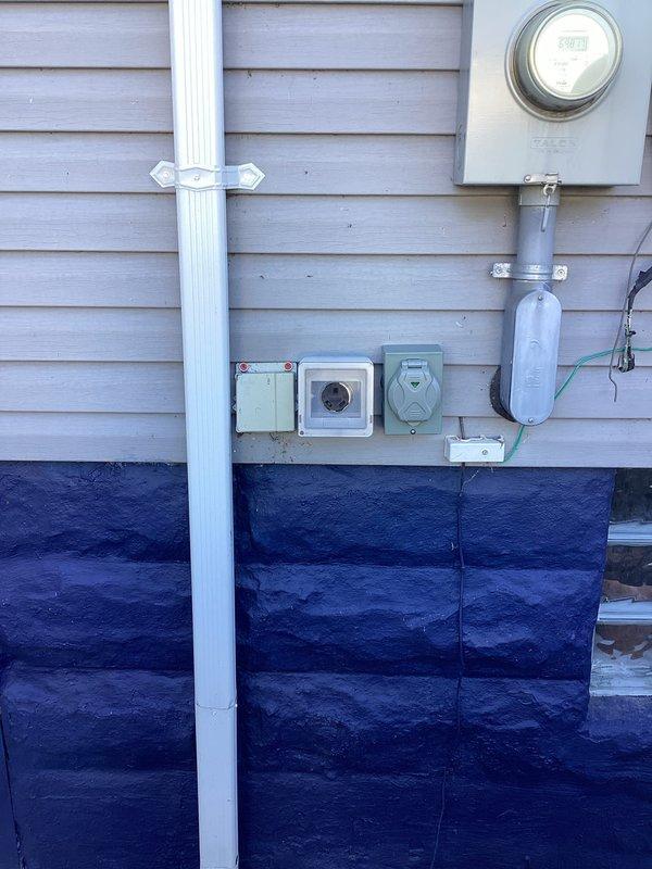 Installed exterior natural gas connection with shutoff valve and quick-connect fitting to supply a Predator 13,000-watt tri-fuel portable generator operating at 50A inlet capacity under full natural gas load. Ran new black iron gas piping from existing meter location to designated installation point on exterior wall, securing all lines with appropriate brackets and supports per code requirements. Installed ball-type shutoff valve and camlock-style quick-connect fitting rated for generator application, pressure-tested all connections to verify system integrity and proper gas flow for maximum generator demand. Installed exterior natural gas connection with shutoff valve and quick-connect fitting to supply a Predator 13,000-watt tri-fuel portable generator operating at 50A inlet capacity under full natural gas load. Ran new black iron gas piping from existing meter location to designated installation point on exterior wall, securing all lines with appropriate brackets and supports per code requirements. Installed ball-type shutoff valve and camlock-style quick-connect fitting rated for generator application, pressure-tested all connections to verify system integrity and proper gas flow for maximum generator demand.