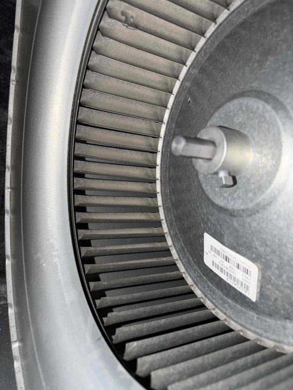 Completed comprehensive heating system maintenance on aging HVAC unit. Performed thorough inspection of blower assembly, noting accumulated dust and debris on squirrel cage fan blades and components. Conducted diagnostic measurements using digital testing equipment to verify system performance and operational parameters.