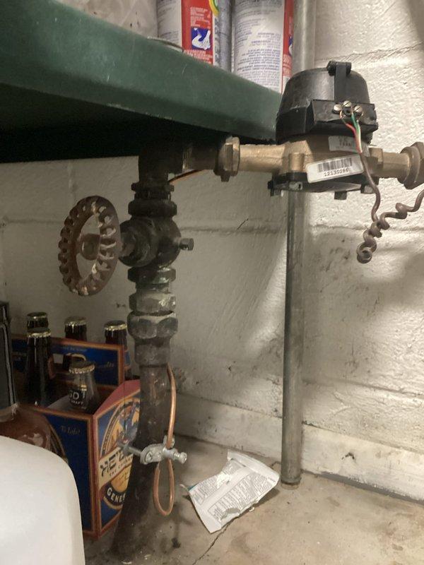 Completed comprehensive plumbing inspection of utility room and identified multiple shut-off valves requiring replacement due to age and wear. Replaced deficient shut-off valves on copper pipe manifold system, ensuring proper operation and leak-free connections. All valves tested for functionality and system verified operational upon completion.