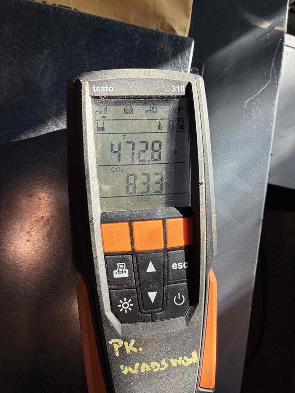 Completed annual maintenance and tune-up on 9-year-old boiler system for preferred service plan customer. Performed comprehensive system inspection, drained sediment from boiler via drain valve to remove accumulated mineral deposits and improve efficiency, and conducted combustion analysis using Testo 310 analyzer which measured CO₂ levels at 8.33% and flue gas temperature at 472°F, confirming proper combustion efficiency and safe operation within manufacturer specifications. Completed annual maintenance and tune-up on 9-year-old boiler system for preferred service plan customer. Performed comprehensive system inspection, drained sediment from boiler via drain valve to remove accumulated mineral deposits and improve efficiency, and conducted combustion analysis using Testo 310 analyzer which measured CO₂ levels at 8.33% and flue gas temperature at 472°F, confirming proper combustion efficiency and safe operation within manufacturer specifications.