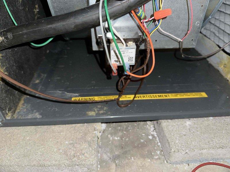 Completed routine heating maintenance on 2-year-old Goodman HVAC system. Performed electrical diagnostics using clamp meter to verify proper amperage and voltage readings, inspected all electrical connections and wiring at the unit, and examined interior components including relays and refrigerant lines. All systems tested within normal operating parameters and unit confirmed operational.
