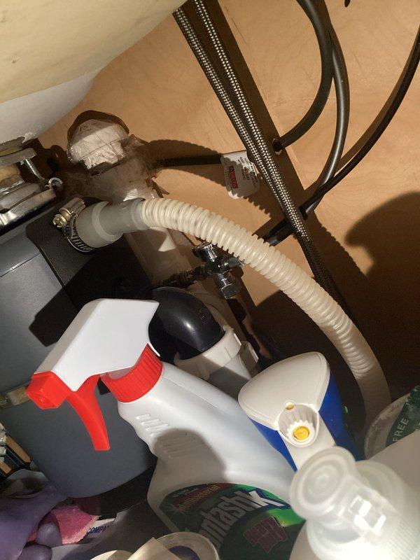 Conducted comprehensive plumbing inspection of residential kitchen and utility area. Examined kitchen sink installation, faucet operation, and supply line connections, noting minor staining in double-basin stainless steel sink. Inspected utility room plumbing components including water supply lines, flexible hoses, shut-off valves, and connection points to verify proper installation and identify any potential leaks or maintenance concerns. Conducted comprehensive plumbing inspection of residential kitchen and utility area. Examined kitchen sink installation, faucet operation, and supply line connections, noting minor staining in double-basin stainless steel sink. Inspected utility room plumbing components including water supply lines, flexible hoses, shut-off valves, and connection points to verify proper installation and identify any potential leaks or maintenance concerns.