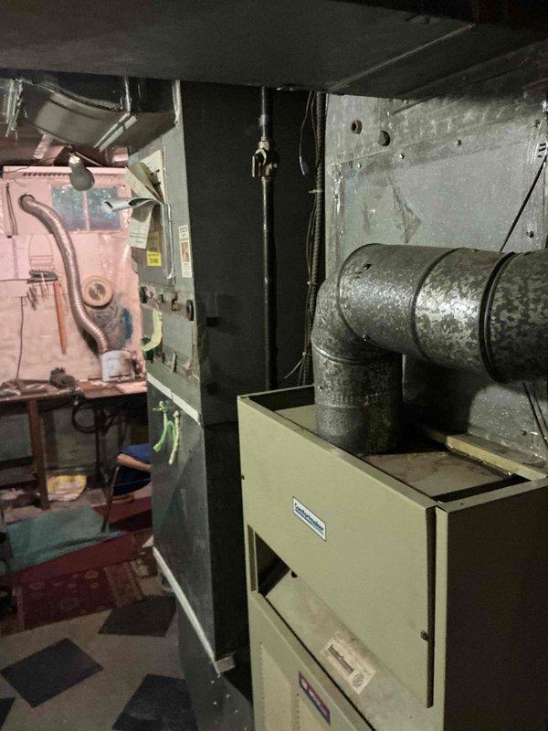 Conducted comprehensive assessment of existing HVAC system for full replacement estimate. Evaluated 2001 air conditioning unit showing significant deterioration with visible rust and corrosion on fan blades and components, along with 1989 furnace system located in basement mechanical room. Documented equipment conditions, accessibility, and installation requirements. Presented complete system replacement options to address aging infrastructure and improve heating and cooling efficiency. Conducted comprehensive assessment of existing HVAC system for full replacement estimate. Evaluated 2001 air conditioning unit showing significant deterioration with visible rust and corrosion on fan blades and components, along with 1989 furnace system located in basement mechanical room. Documented equipment conditions, accessibility, and installation requirements. Presented complete system replacement options to address aging infrastructure and improve heating and cooling efficiency.