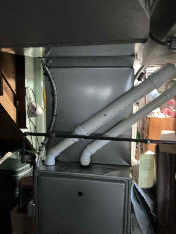 Conducted site assessment and provided furnace replacement options for existing Carrier residential heating system. Evaluated current equipment configuration including cabinet-style furnace with PVC intake and exhaust venting, documented existing installation specifications, and reviewed space constraints in utility area to determine appropriate replacement unit sizing and compatibility with existing ductwork and venting infrastructure. Conducted site assessment and provided furnace replacement options for existing Carrier residential heating system. Evaluated current equipment configuration including cabinet-style furnace with PVC intake and exhaust venting, documented existing installation specifications, and reviewed space constraints in utility area to determine appropriate replacement unit sizing and compatibility with existing ductwork and venting infrastructure.