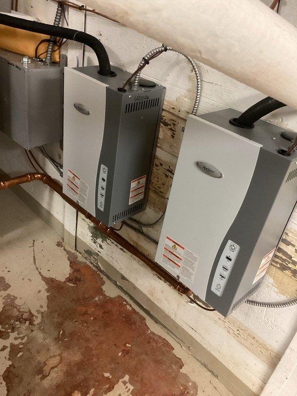 Performed seasonal HVAC system transition by shutting down air conditioning units and activating heating systems as requested. Documented existing mechanical room configuration including tankless water heaters, cooling loop pump controls, and associated plumbing infrastructure to ensure proper system identification for future service calls. Performed seasonal HVAC system transition by shutting down air conditioning units and activating heating systems as requested. Documented existing mechanical room configuration including tankless water heaters, cooling loop pump controls, and associated plumbing infrastructure to ensure proper system identification for future service calls.