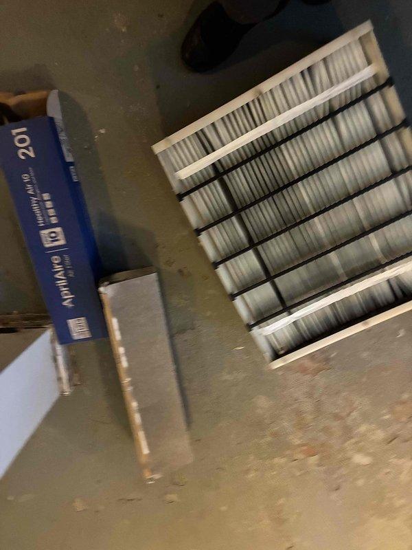 Replaced existing Carrier 31MF filter media with new unit. Removed old filter assembly from HVAC system, installed fresh pleated filter media in frame, and verified proper fit and seal within the air handler housing to ensure optimal airflow and filtration efficiency.