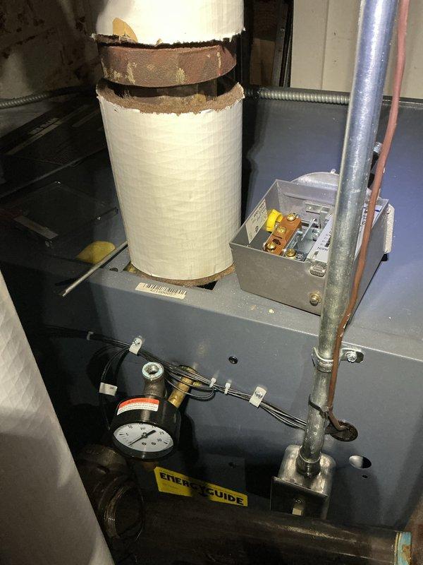 Returned to property to replace burner assembly component on boiler system as previously scheduled. Coordinated site access through designated contact prior to arrival. Successfully installed replacement part and verified proper burner operation. Completed comprehensive boiler maintenance service including inspection of heat exchanger, pressure gauge readings, control system functionality check, and examination of associated humidifier equipment. All systems tested and confirmed operational upon completion.